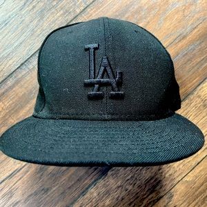 LA Dodgers flat brim hat.